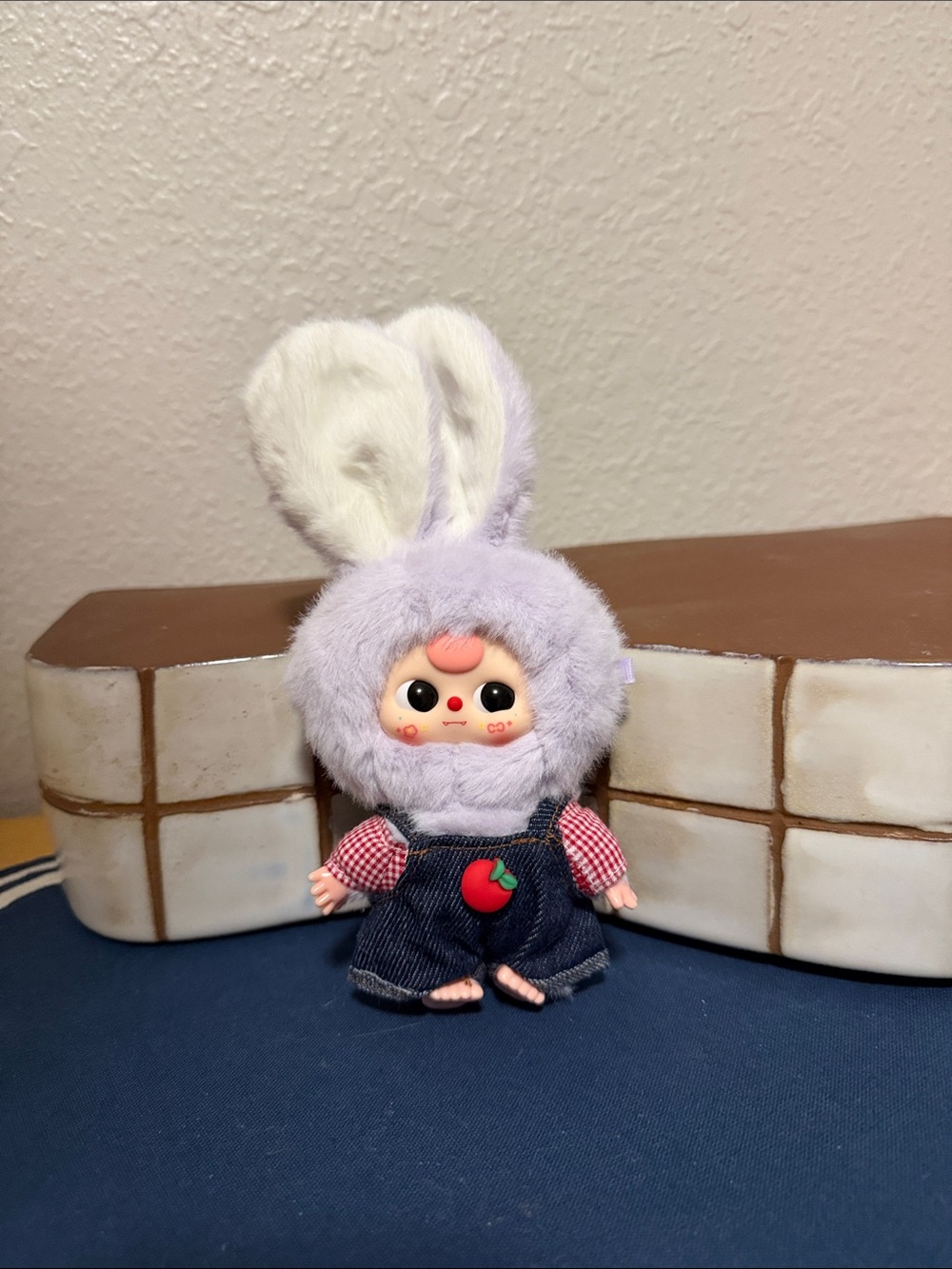 Baby Three 50% keychain Apple overalls with lavender body